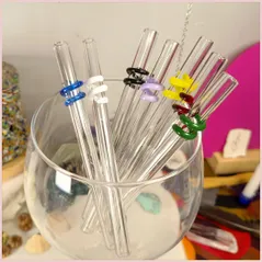 Multiple colours of straws inside a glass