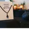 Black Obsidian crystal bound simply with a black wire onto a chunky black chain
