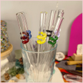 Multiple colours of straws inside a glass