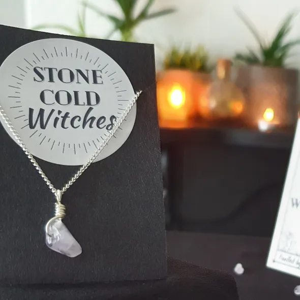 Small amethyst polished crystal on a dainty silver chain, bound using a simple silver wire wrap