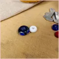 the repton bead and a small white bead