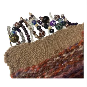 hand spun clutch bag with beading