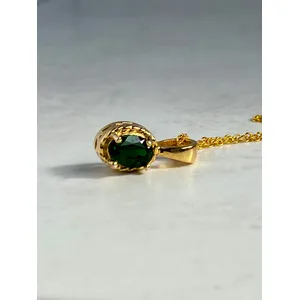 gold green gemstone pendant