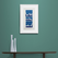 Blue White and Teal Waves Print in Framed in White on a Blue Wall Above Dark Shelf and Vase Set