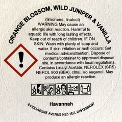 orange blossom wild juniper and vanilla candle clp label