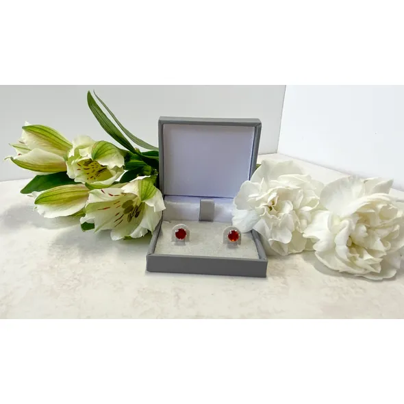 Sterling silver orange (Hessonite) garnet earrings in a box
