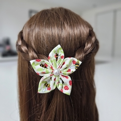 Handmade hair flower displayed in the hair