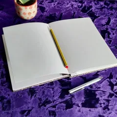 open notebook with pen