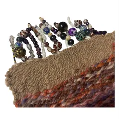 hand spun clutch bag with beading