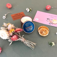 orange blossom wild juniper and vanilla beeswax blend tin candle with dried flowers and gift card