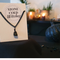 Black Obsidian crystal bound simply with a black wire onto a chunky black chain