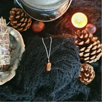 Orange carnelian crystal on silver chain in a simple wire wrap