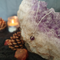 Small amethyst sphere bound in a simple wire wrap onto silver chain