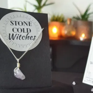 Small amethyst polished crystal on a dainty silver chain, bound using a simple silver wire wrap