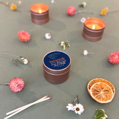 orange blossom wild juniper and vanilla tin candle made with beeswax